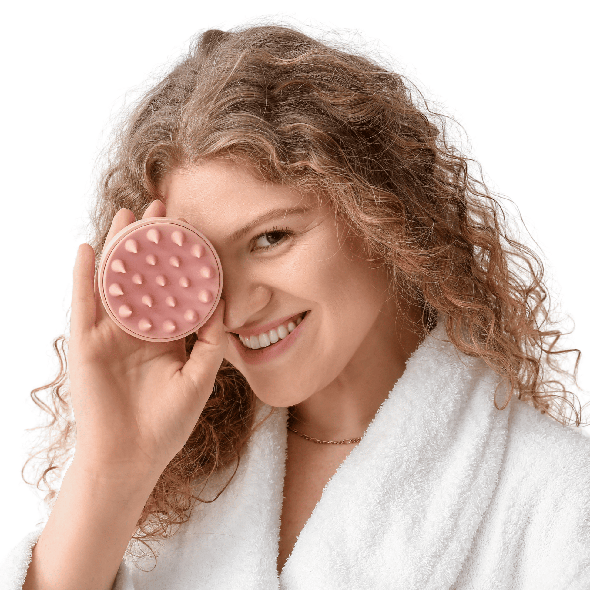 Licht roze haar massage borstel in hand vrouw